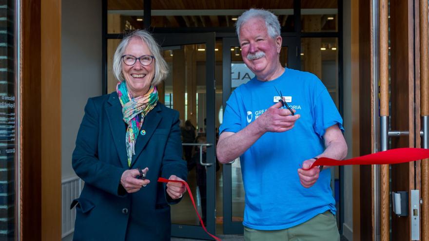 Mayor and Greater Victoria Public Library representative at the ribbon cutting for the Esquimalt branch in 2022.